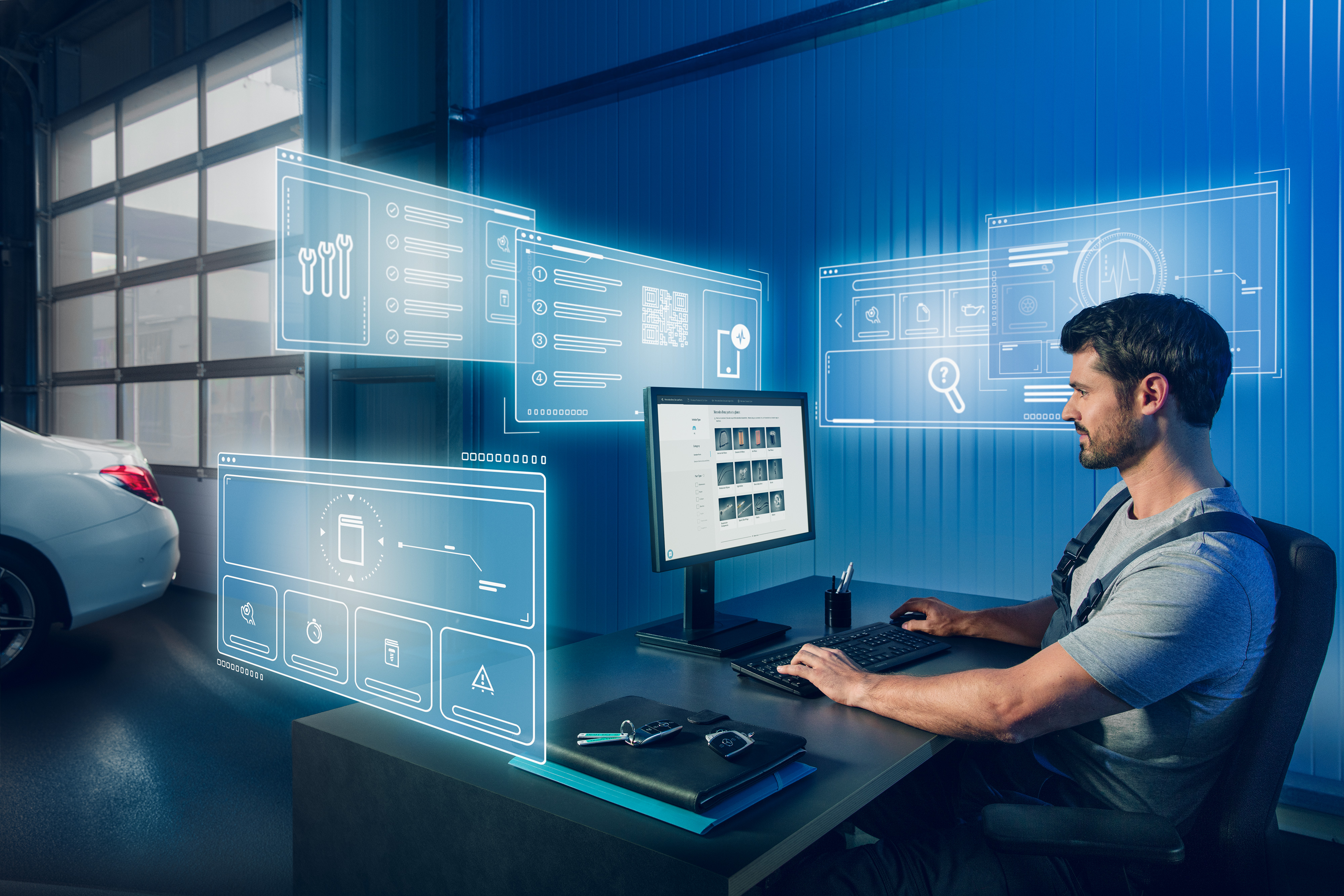 Mercedes-Benz Bedrijfswagens | Kwaliteit originele onderdelen Monteur zoekt op computer naar Mercedes-Benz originele onderdelen in de onderdelencatalogus.