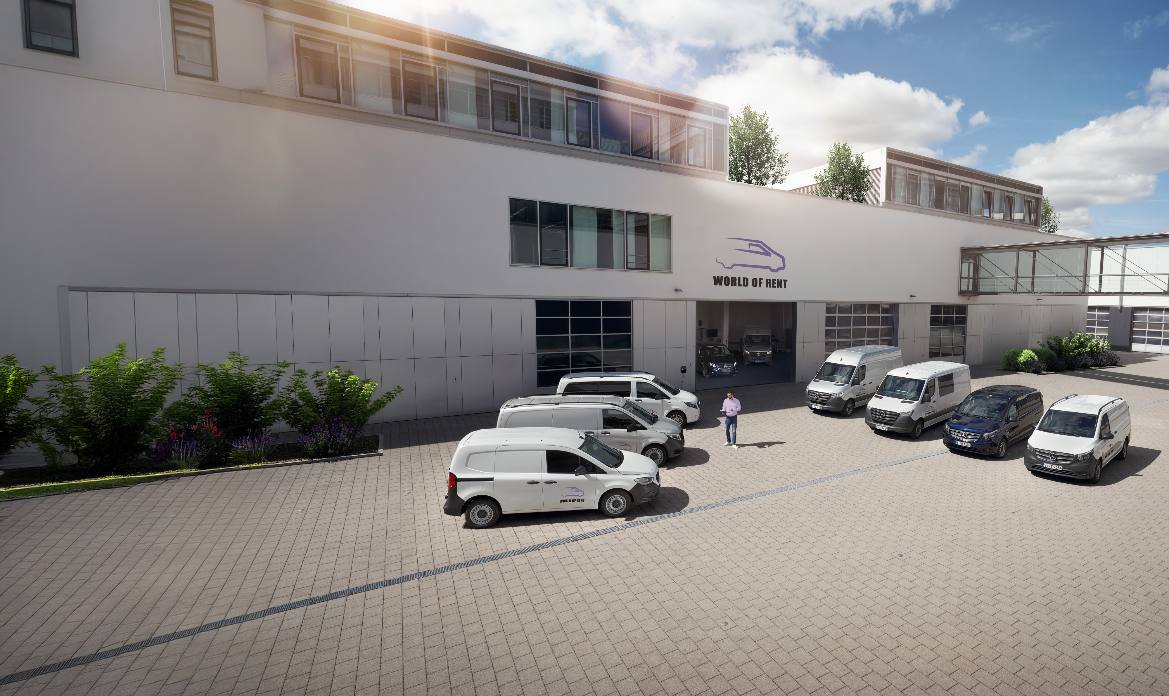 Mercedes-Benz | Services de flotte utilitaires | Conseil Une flotte de véhicules utilitaires Mercedes-Benz devant le bâtiment d’une entreprise.